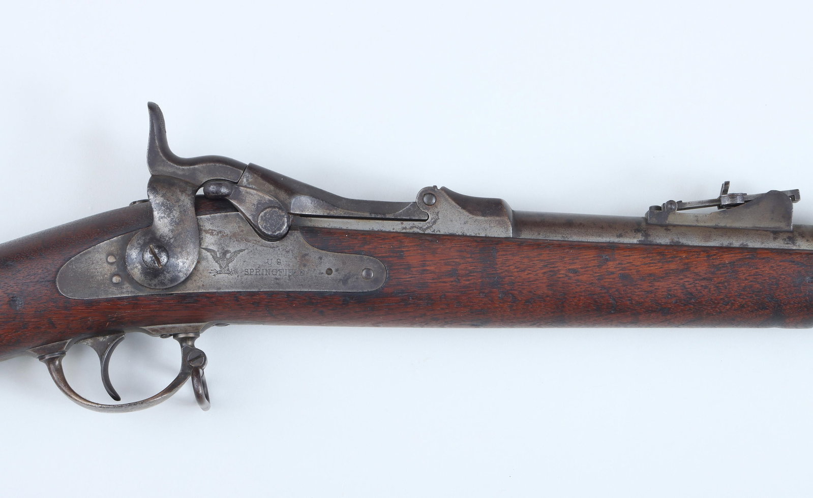 U.S. Springfield Model 1877 Trapdoor: U.S. Springfield Model 1877 Trapdoor rifle in 45-70, with additional bayonet and trowel. The Model 1877 was a transitional model 1873-1879; according to Flayderman it was produced from 1877-1878. The 