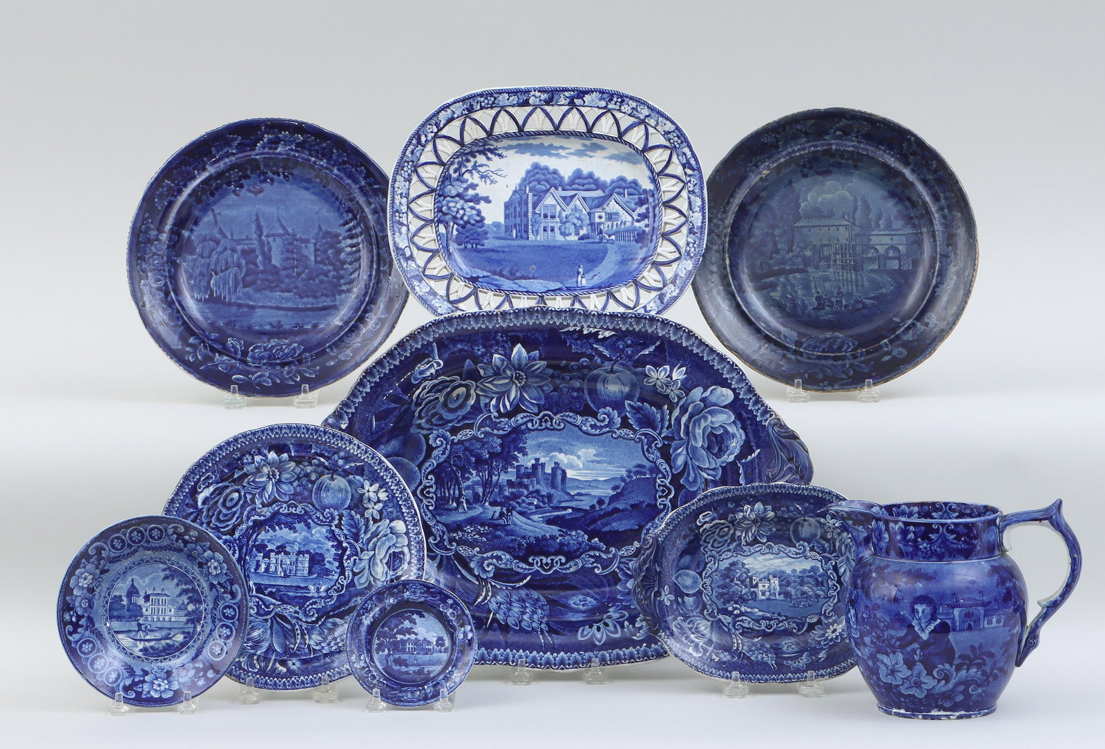 Group of (9) Staffordshire: Group of (9) Staffordshire flow blue transfer-ware table articles having European landscapes with buildings, to include: (5) 19th century Ralph Hall & Co. items, comprising ''Conway Castle, Carnarvons