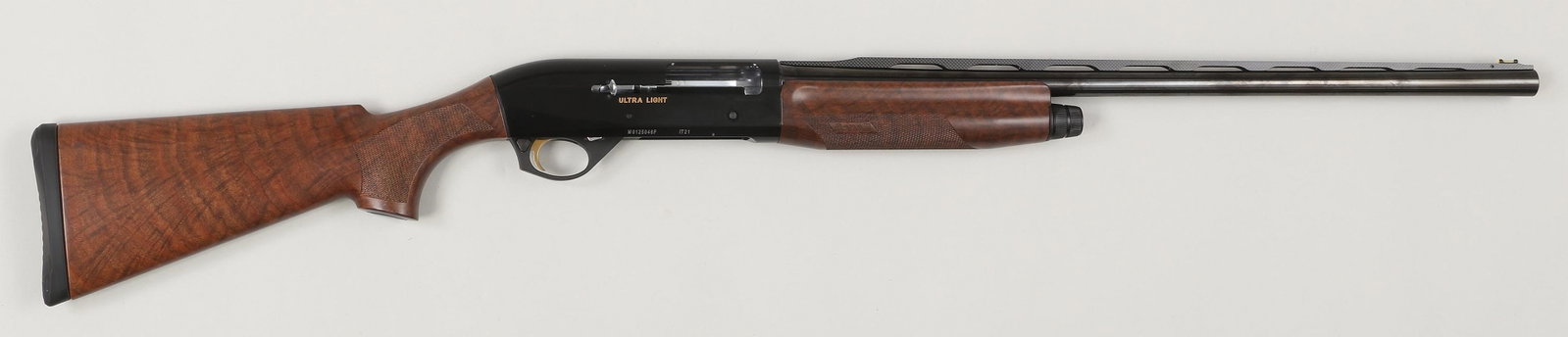 New Benelli Ultra Light auto loader in 12 gauge: Benelli Ultra Light auto loader in 12 gauge, 2-3/4'' or 3''. The barrel measures 26'' with factory screw-in chokes I/C, Mod. and Full with carbon fiber vent rib and red or yellow fluorescent front sig
