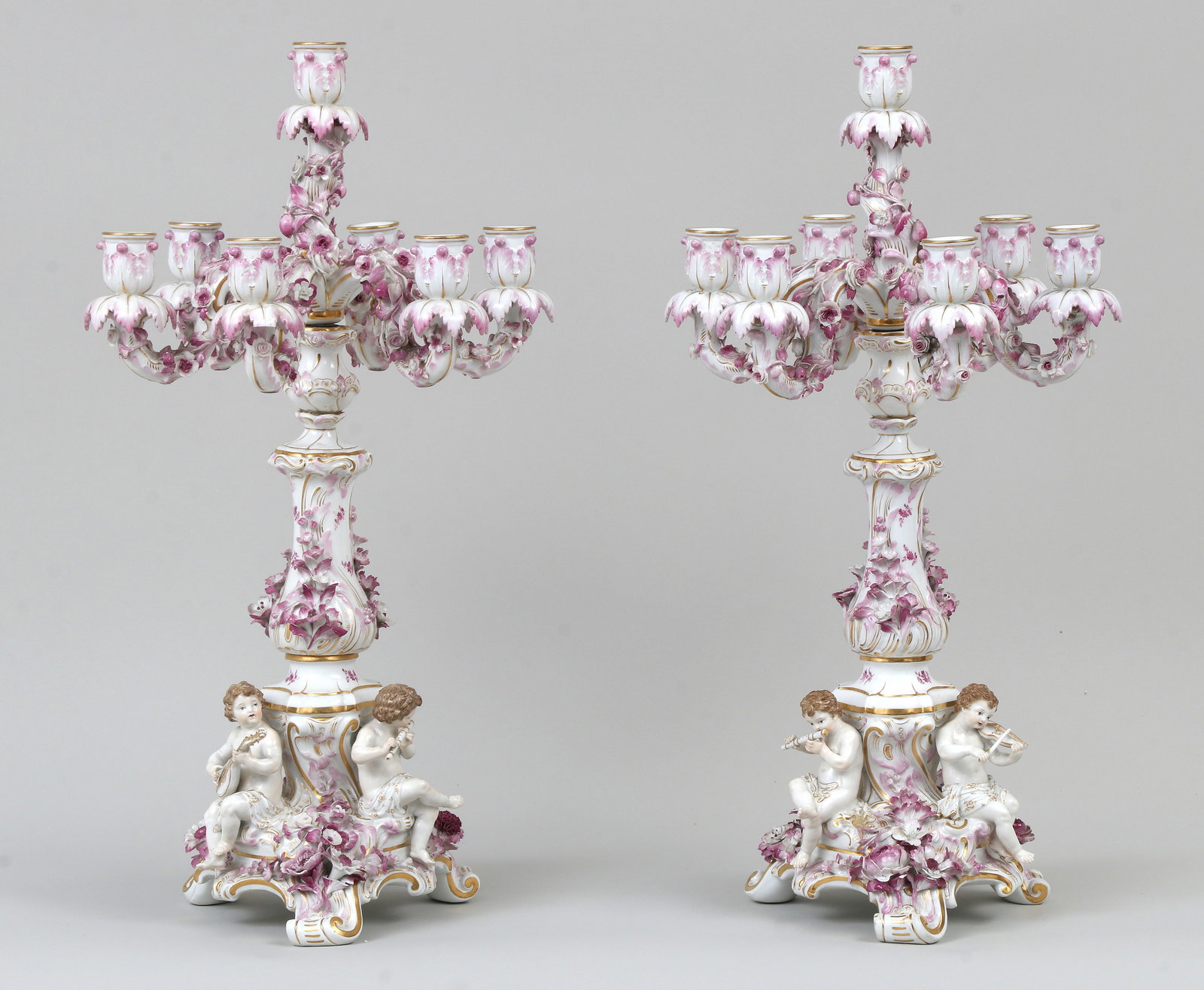 Pair of Meissen Rococo-Style Porcelain Seven-Light Candelabra: Pair of Meissen Rococo-Style Porcelain Seven-Light Candelabra 19th century Hand-painted and parcel gilt decorated, probably after a design by Ernst August Leuteritz, having foliate and floral decorate