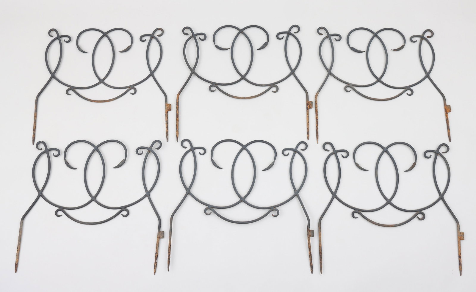 Set of (6) Wrought Iron Garden Edging: Set of (6) Wrought Iron Garden Edgingwith scrolled and foliate design.22 3/4 x 24 1/4 in. (57.8 x 61.6 cm.)