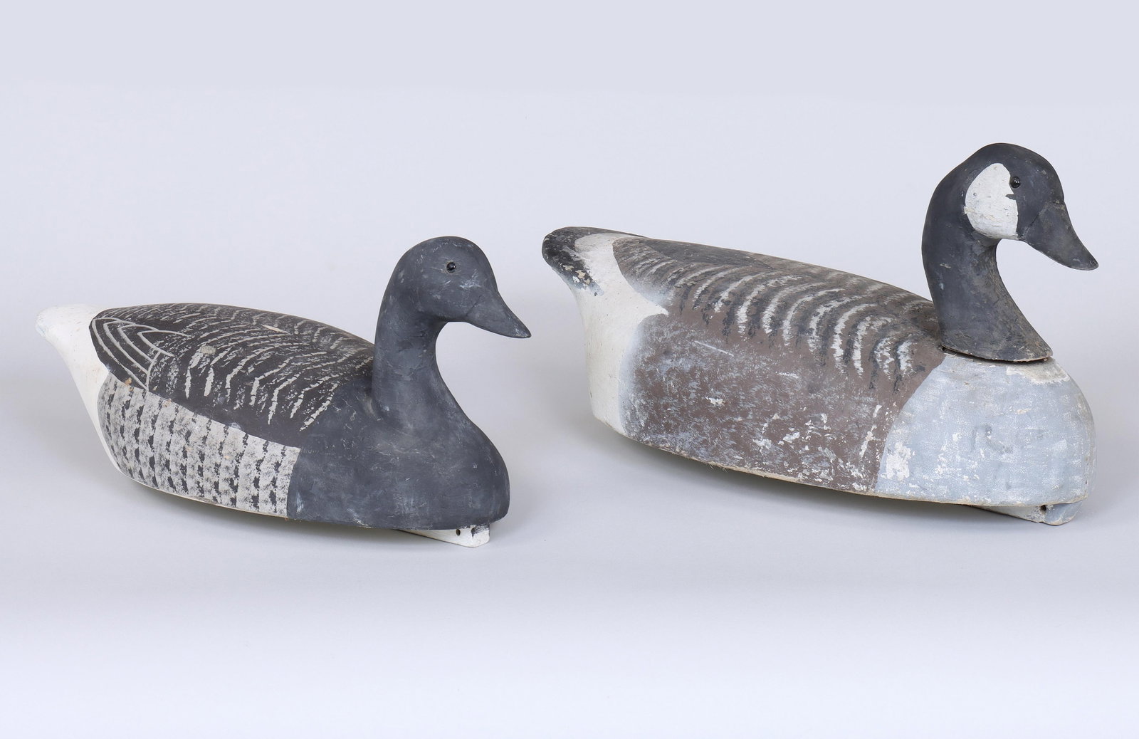 Group of (2) Wildfowler Decoys, Quogue, Long Island Factory: Group of (2) Wildfowler Decoys, Quogue, Long Island Factory The Brandt appears to be in original paint with very little in-use wear. The goose has areas of touch-up and craquelure but remains in very 