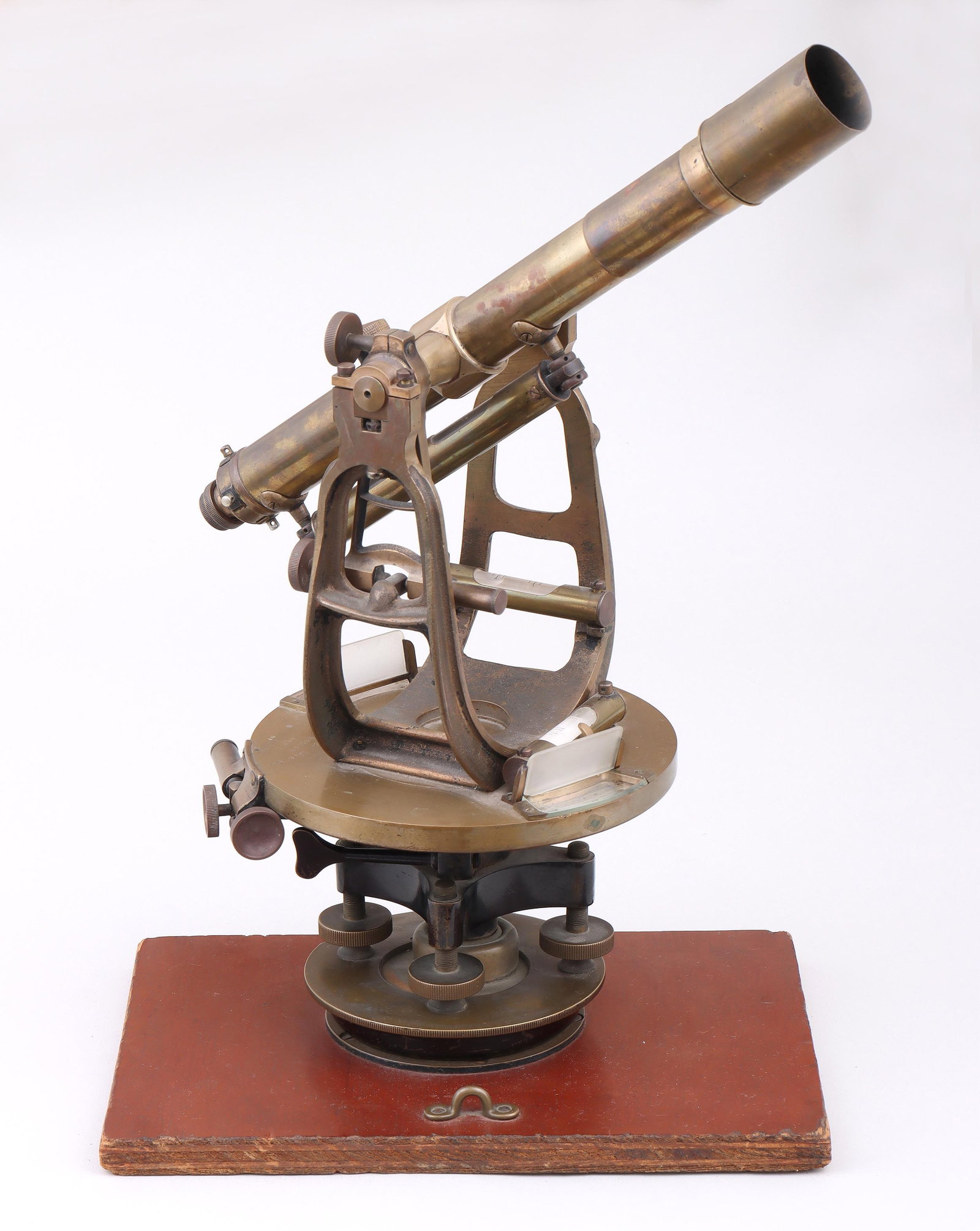Brass Surveyor’s Transit Level Scope: Brass Surveyor’s Transit Level Scope Buff & Buff Mfg. Co., Boston, MA, 19th/20th century serial no. 10132, the 14-inch scope in mount with spirit or bubble levels, over a dial with vernier readouts,