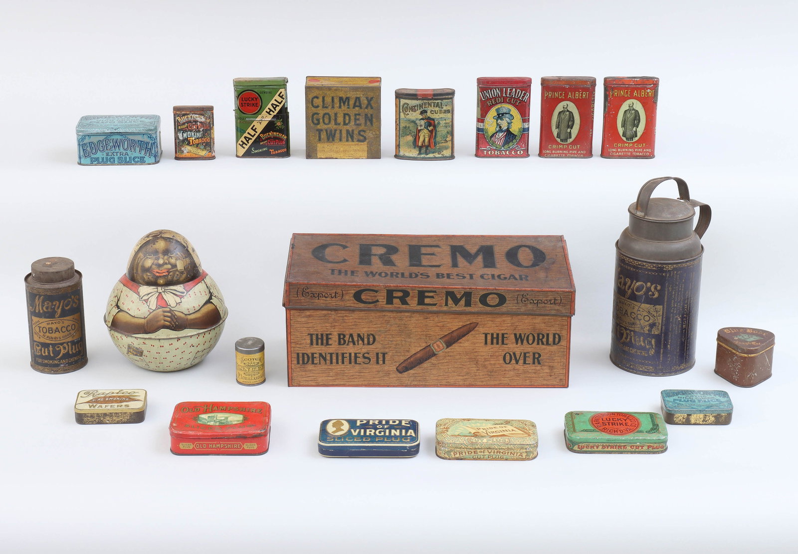 Group of (20) Tobacco Tins: Group of (20) Tobacco Tins to include: Cremo cigar humidor, (minor repair to lid); Mayo's "Brownie" roly poly cannister, (paint loss); (2) Mayo's cut plug cannisters, (larger with top handle