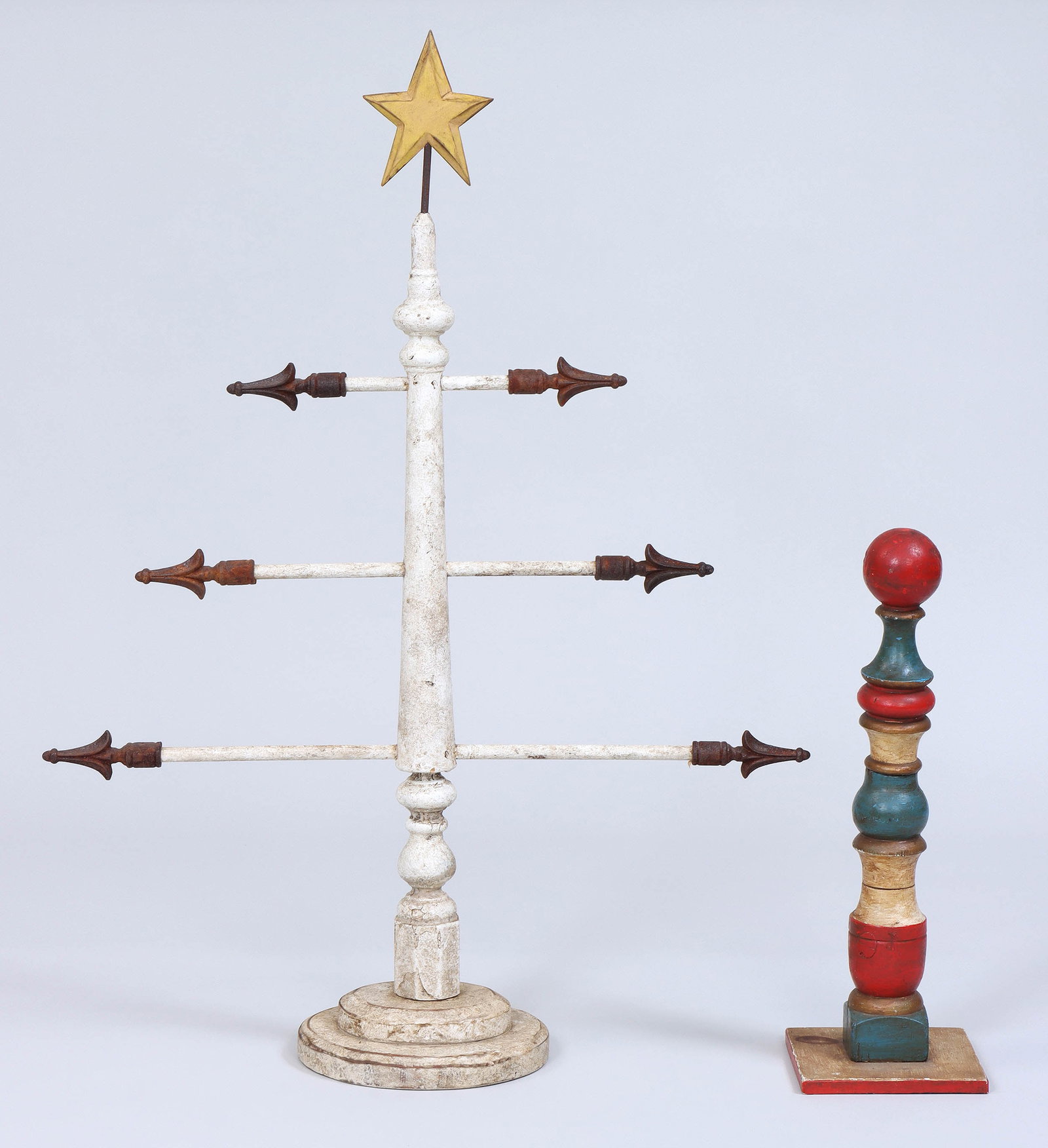 Group of (2) Folk Art Wood Finials: Group of (2) Folk Art Wood Finials to include: large white-painted tree-form finial, topped with a yellow-painted star, the turned-wood column pierced by (3) wood dowels of graduating lengths, with ca