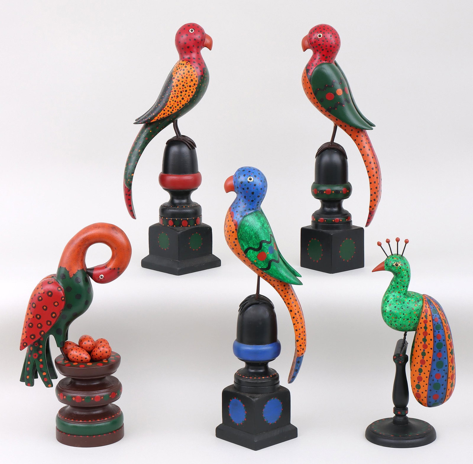 Don Noyes (American, 20th/21st century), (5) Folk Art Birds: Don Noyes American, (20th/21st century) Group of (5) Folk Art Birds carved and painted wood signed and dated to underside. Tallest (blue parrot) 15-1/2"h Provenance: Property of a South Shore, Lo