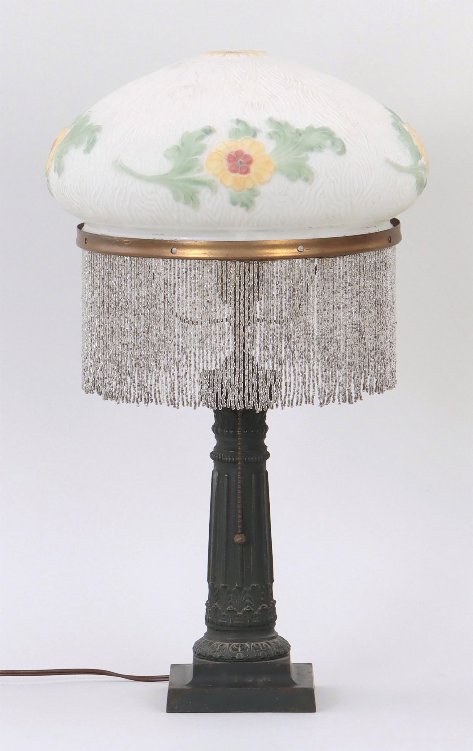 Boudoir Lamp with "Puffy" Blown-Mold, Reverse-Painted Glass Shade: Boudoir Lamp with "Puffy" Blown-Mold, Reverse-Painted Glass Shade with floral design, on Corinthian column base with beaded fringe. Overall 20-1/4''h.