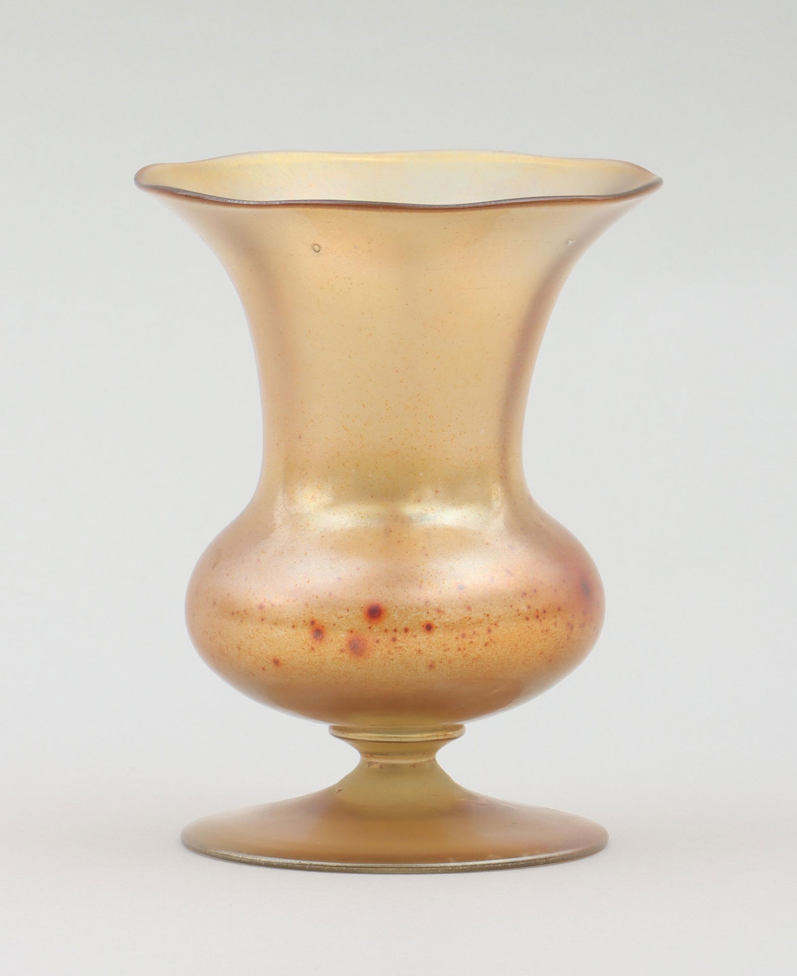 Tiffany Studios Favrile Glass Footed Vase: Tiffany Studios Favrile Glass Footed Vaseof bulbous form with flared rim, signed ''L.C.T. Favrile'' on bottom.5-3/8"h x 4-3/16"dia