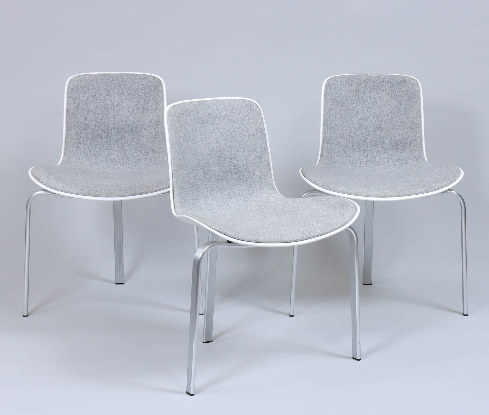 Set of (8) Poul Kjaerholm for Fritz Hansen "PK8" Chairs: Set of (8) Poul Kjaerholm (Danish, 1929-1980) for Fritz Hansen "PK8" Chairshaving molded plastic seat with wool upholstery and aluminum legs, seven fabricated in 2008, one in 2012, marked.30 1/2 x 23