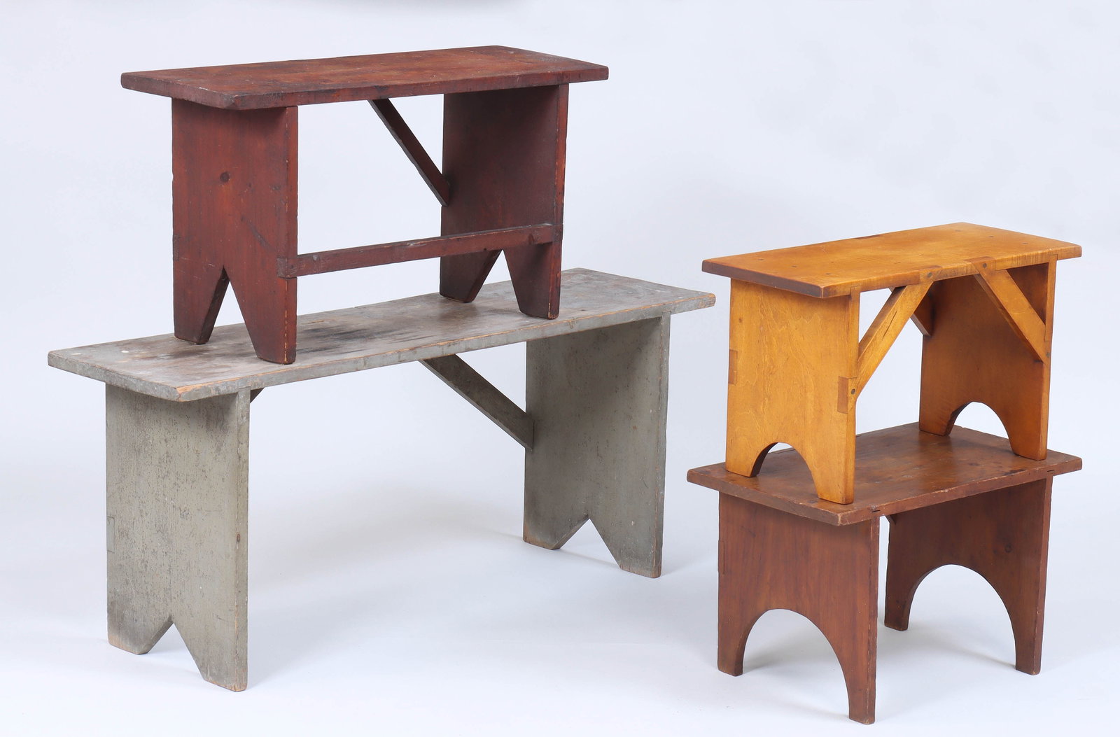 Group of (4) Benches: Group of (4) Benches American, 19th/20th century, to include: large gray-painted bench with bootjack ends and side braces, 20th century; red-painted bench with bootjack ends and side braces, 19th cent