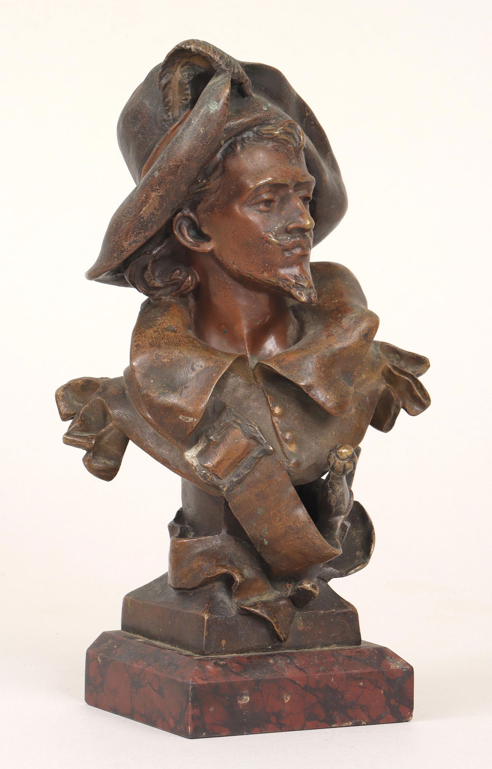 Charles Vital-Cornu (French 1851-1927), Bust of Musketeer, bronze with brown patina: Charles Vital-CornuFrench, 1851-1927Bust of Musketeerbronze with brown patinasigned ''Vital-Cornu'', stamped with Societe des Bronzes de Paris foundry mark, on marble base. 9''h (including 7/8'' base)
