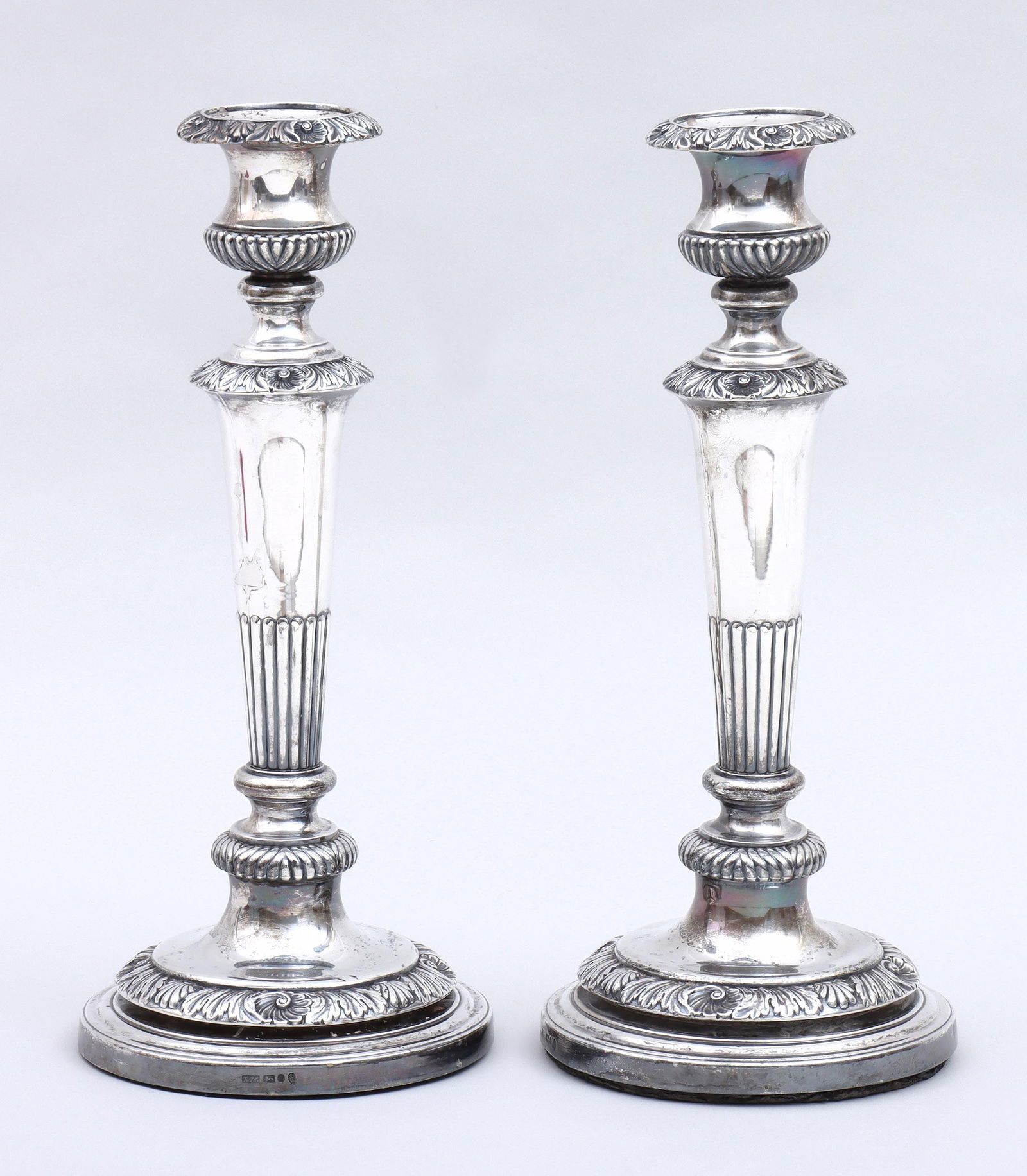 Pair of George III Weighted Sterling Silver Candlesticks Thomas & James Creswick, Sheffield, 1814: Pair of George III Weighted Sterling Silver CandlesticksThomas & James Creswick, Sheffield, 1814having stop-reeded columns, stop-reeded candle cups and borders with shells and scrolled foliate design,