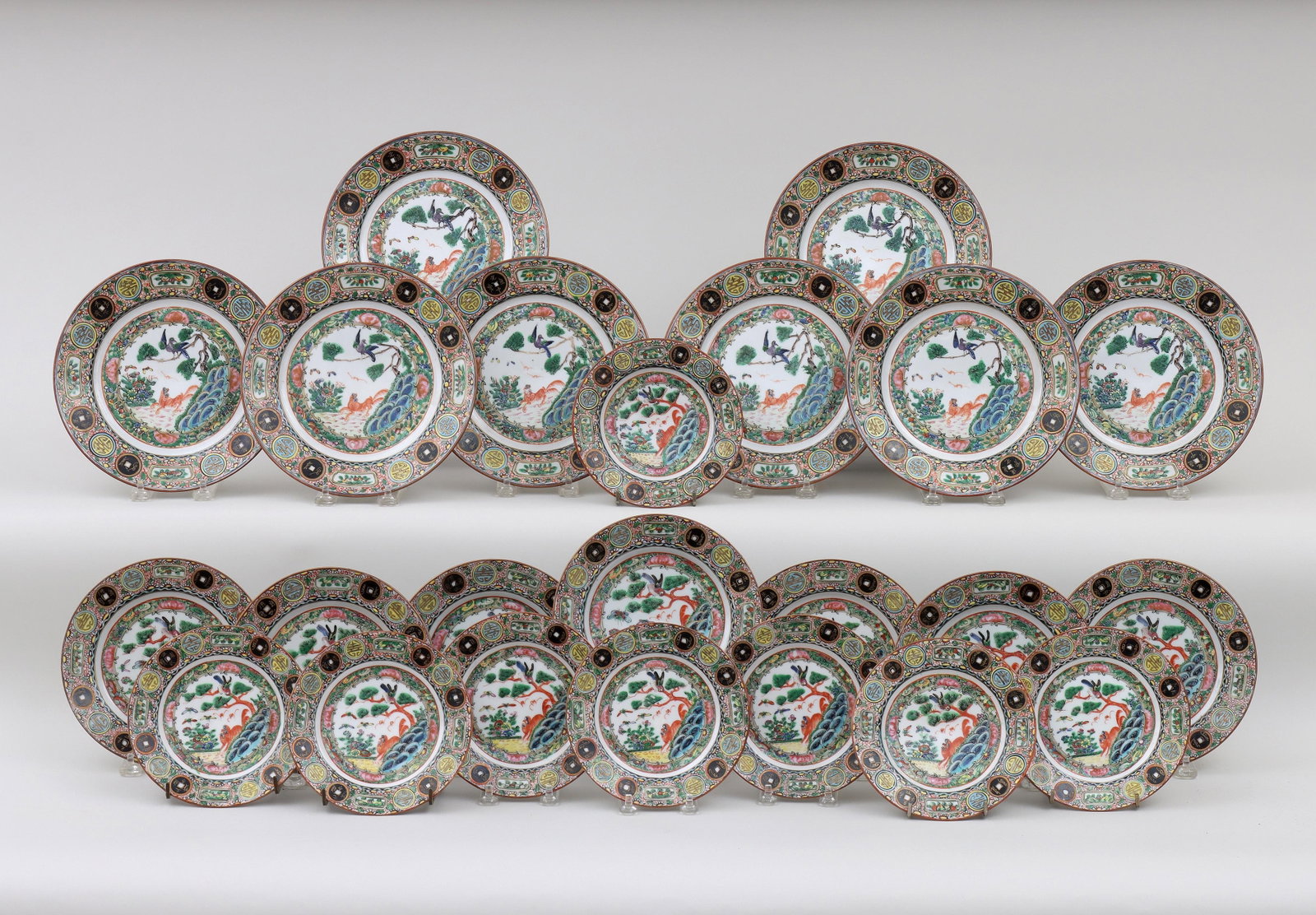 Set of (23) Chinese Export Rose Medallion Porcelain Dishes: Set of (23) Chinese Export Rose Medallion Porcelain Dishes having shou medallions and peach clusters to borders, center scene of foo dog and bird in garden, to include: (8) salad plates; (7) dessert p