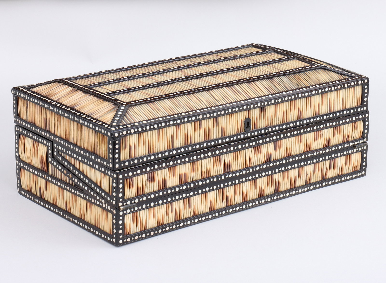 Anglo-Indian Porcupine Quill and Ebonized Wood Lapdesk: Anglo-Indian Porcupine Quill and Ebonized Wood Lapdesk having top with beveled edges, panels with porcupine quills and borders with dot inlay; the inside of the lid having scrolled floral design with 