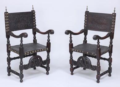Pair of Iberian Carved Walnut and Tooled Leather Armchairs