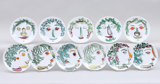 Piero Fornasetti (Italian 1913-1988), Group of (11) "Vegetalia" and "Arcimboldesca" Plates