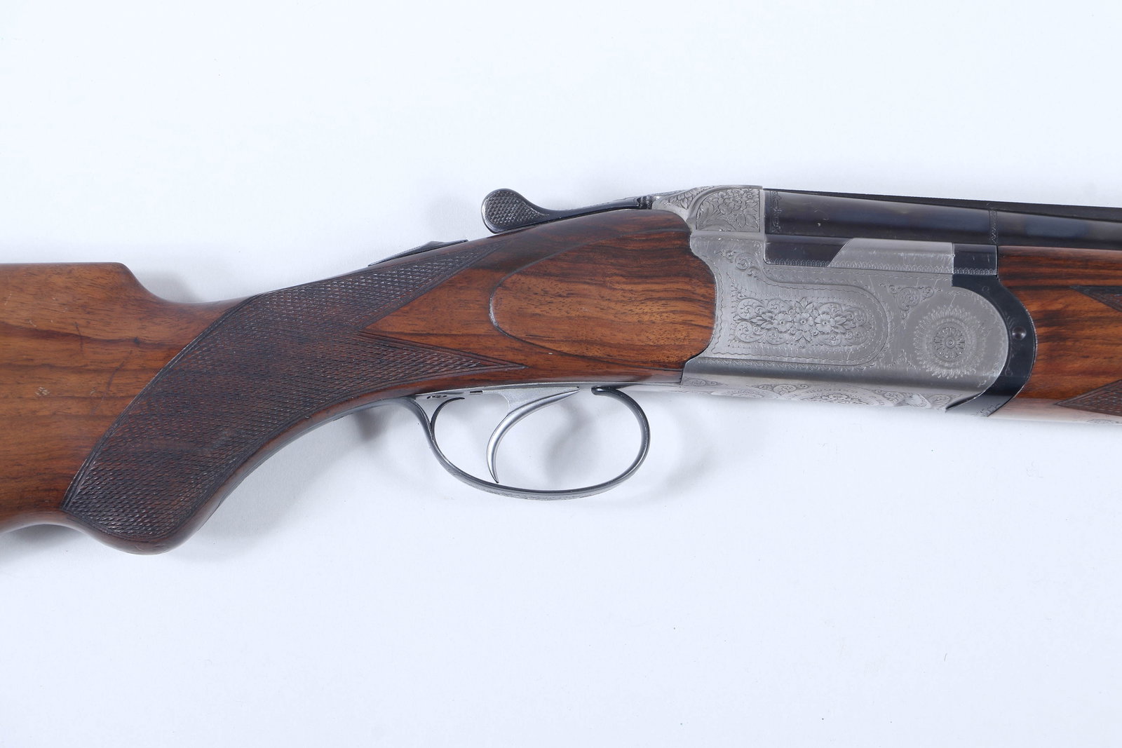 Beretta Model S57E O/U Game Gun in 12g 2-3/4": Beretta Model S57E O/U Game Gun in 12g 2-3/4" The narrow vent rib barrels measure 28" having choked I/C & I/M with ejectors and non-selective single trigger. The stock dimensions are 1-3/8&q