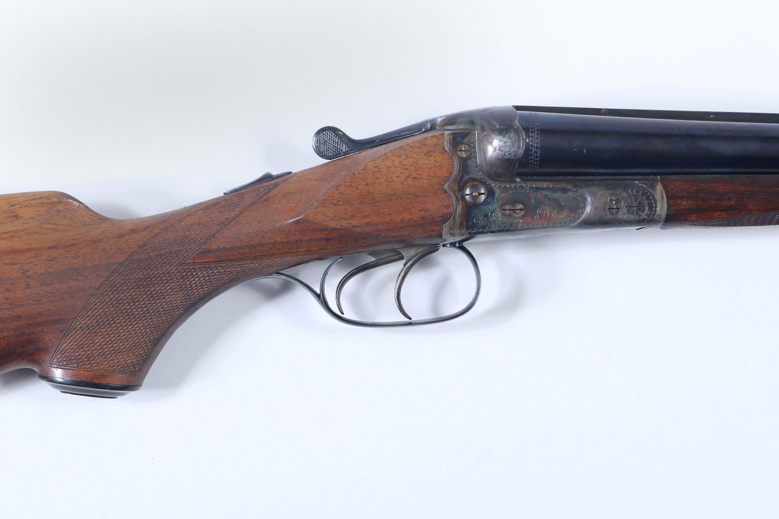 J.P. Sauer and Sohn Boxlock Ejector Double in 2-3/4" 16g: J.P. Sauer and Sohn Boxlock Ejector Double in 2-3/4" 16gThe barrels measure 27-1/2" with perfect bores, full bluing and choked Mod and I/M. The scalloped receiver retains almost all the case