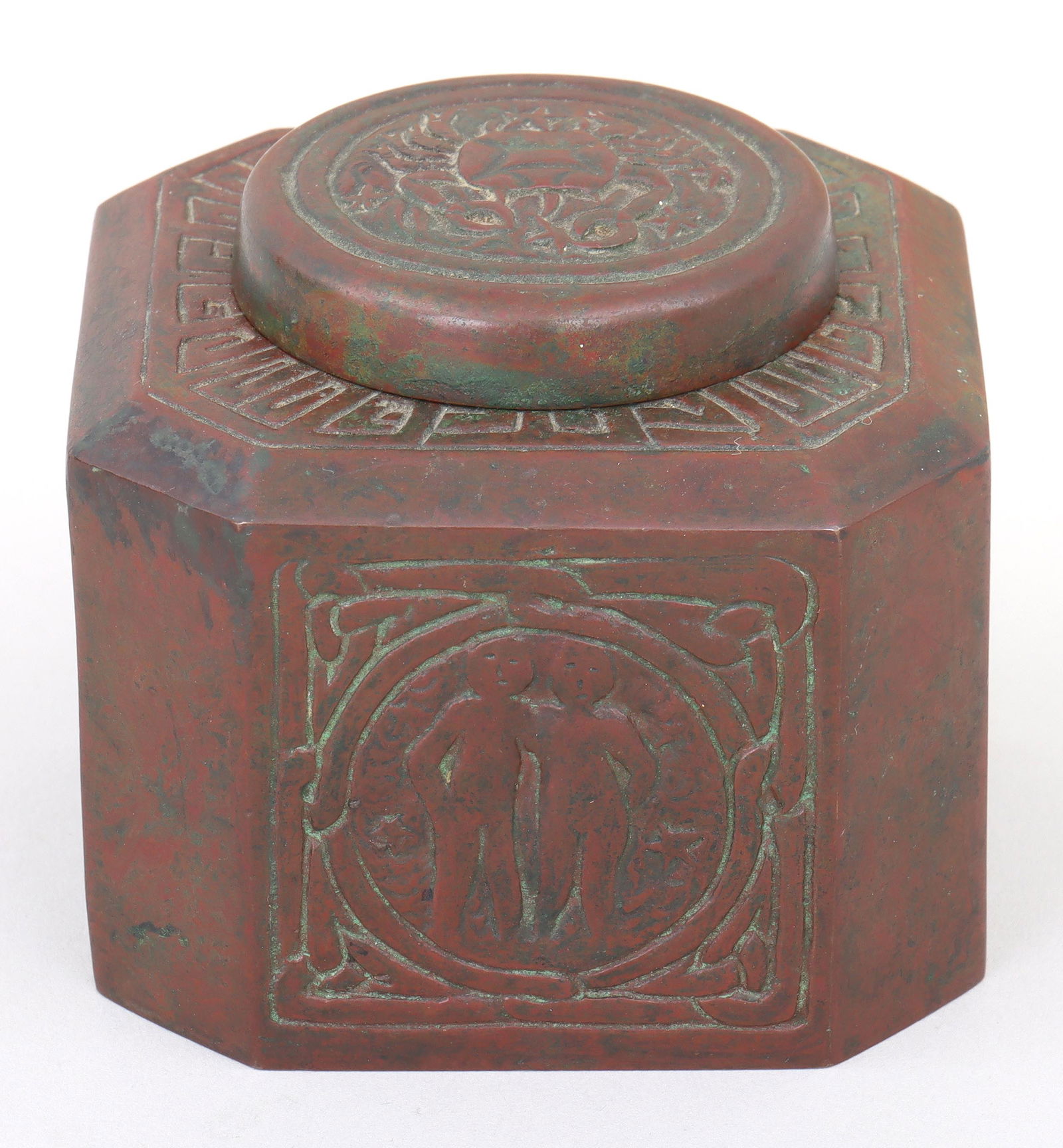 Tiffany Studios "Zodiac" Inkwell: Tiffany Studios Patinated Bronze "Zodiac" Inkwellin the Zodiac pattern, of octagonal form, with glass insert, bottom impressed "Tiffany Studios, New York, 1077".Provenance: Propert