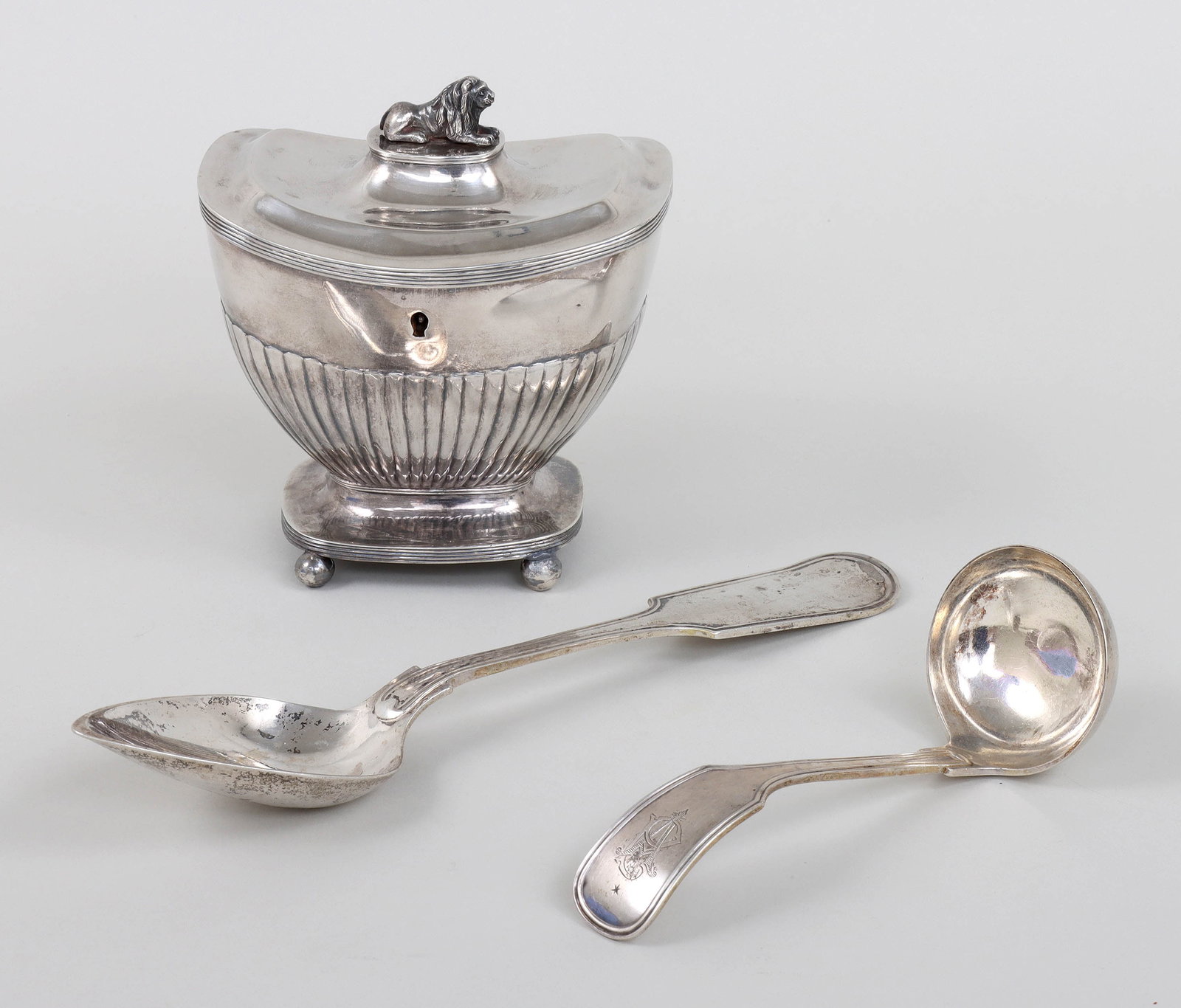 Group of (3) Dutch Silver Table Articles: Group of (3) Dutch Silver Table Articles to include: 19th century .934 silver tea caddy, with recumbent lion finial, reeded borders, stop-reeded body and ball feet, hallmark having Rampant lion mark w