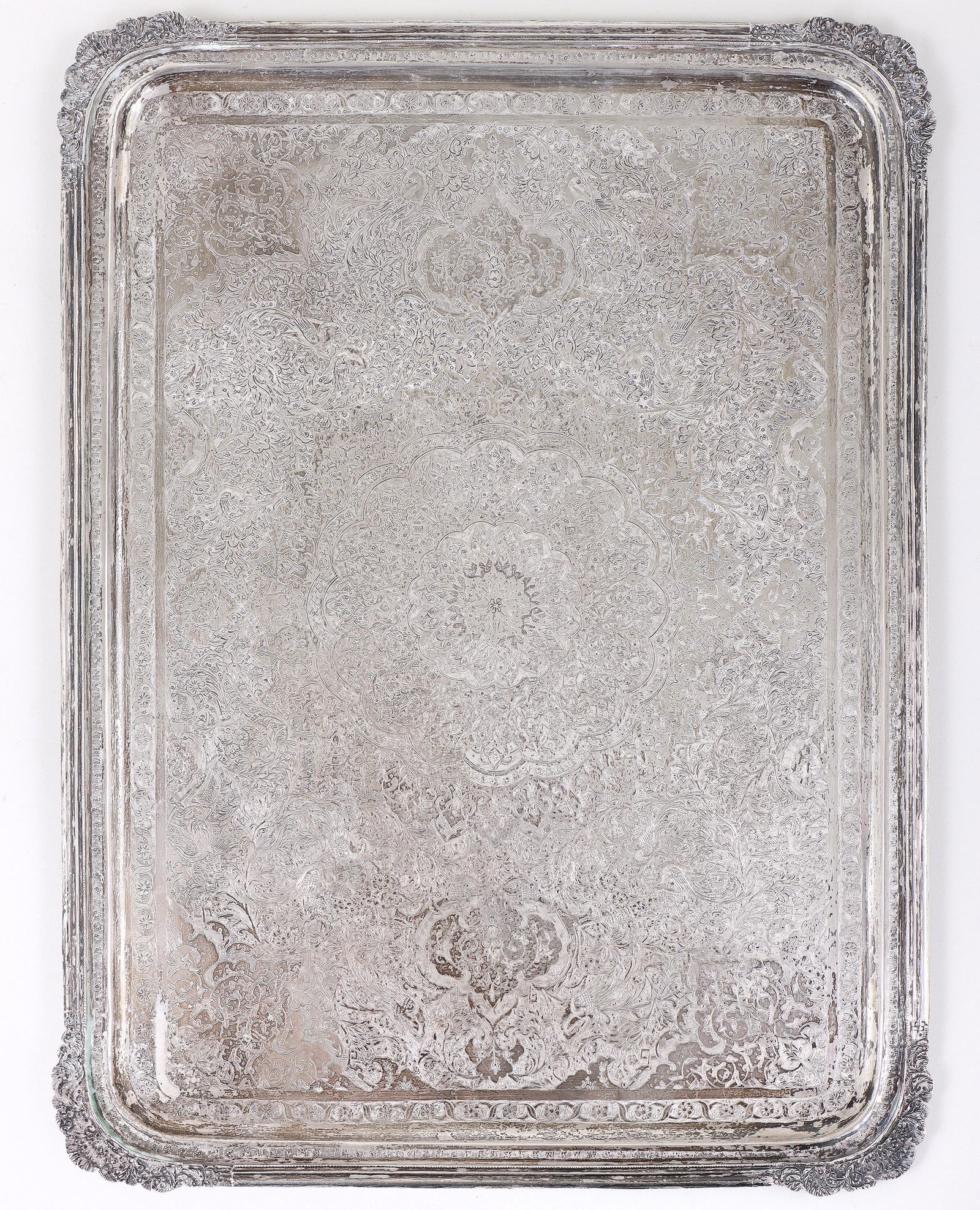 Persian (Iranian) .875 Silver Tray: Persian (Iranian) .875 Silver Trayhaving chased and engraved floral and scrolled foliate design with birds, enclosed by reeded border having scalloped corners with additional scrolled foliate design,