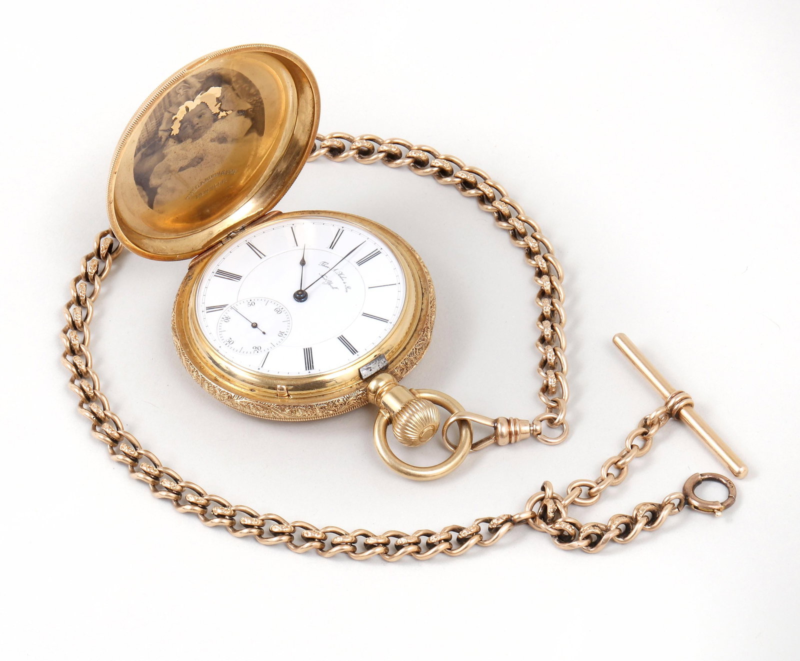 Theodore A. Kohn & Son 18k Gold Hunt-Case Pocket Watch: Theodore A. Kohn & Son 18k Gold Hunt-Case Pocket Watch serial no. 10350, New York, having interior of case front with transfer portrait of a baby, interior of case back with transfer bust portrait of 