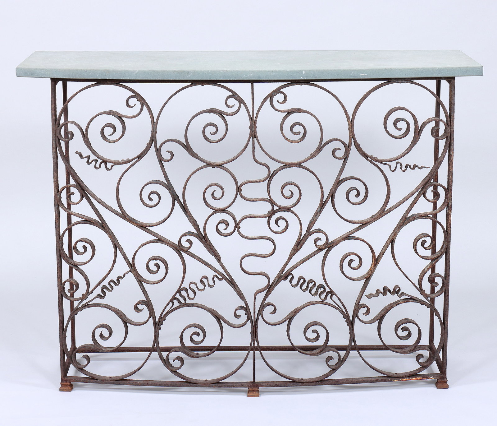 Bowfront Wrought Iron Scrollwork Console Table: Bowfront Wrought Iron Scrollwork Console Table with stone top. 36 3/4 x 18 1/2 x 50 in. (93.3 x 47 x 127 cm.)