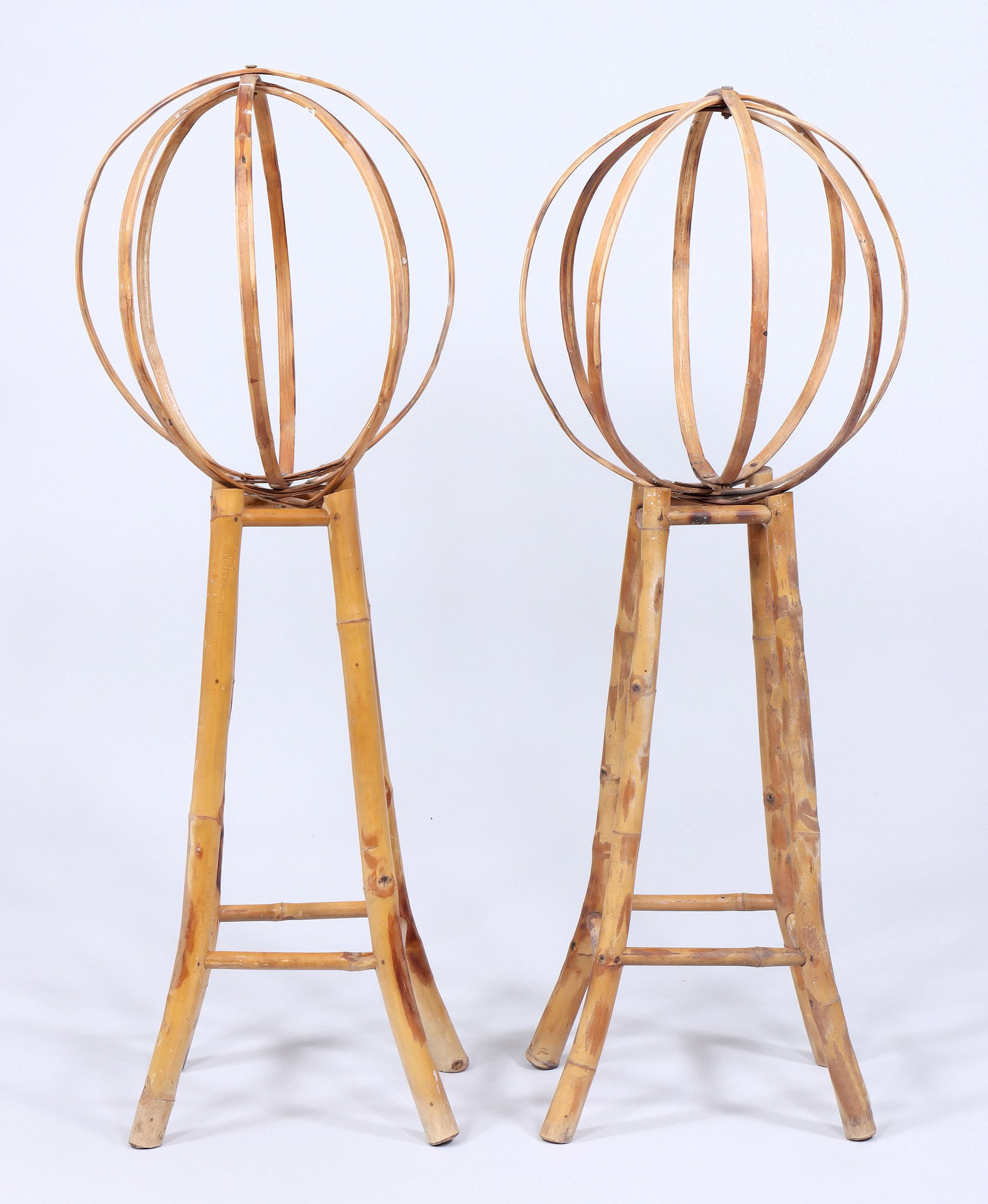 Pair of Bamboo Topiaries: Pair of Bamboo Topiaries having spherical top and square tapering base with splayed legs. 44 x 16 in. (111.8 x 40.6 cm.)