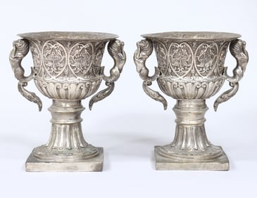 Pair of Small Polished Bronze Footed Urns