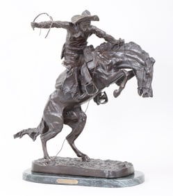 After Frederic Remington (American 1861-1909), "Bronco Buster", bronze