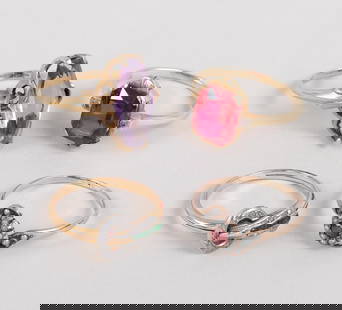 Group of (4) Gold Rings with Stones: Group of (4) Gold Rings with Stonesto include: 18k diamond and emerald buckle ring, having buckle with (6) square-cut emeralds of graduated size channel-set in yellow gold and (24) rough-cut diamonds