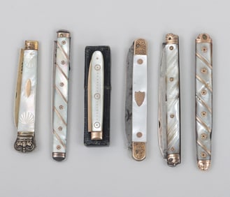 Group of (6) gold and silver folding fruit knives with mother-of-pearl handles.