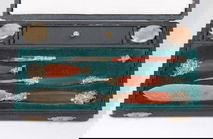 French silver-mounted carnelian handled desk set with writing implements, in original box