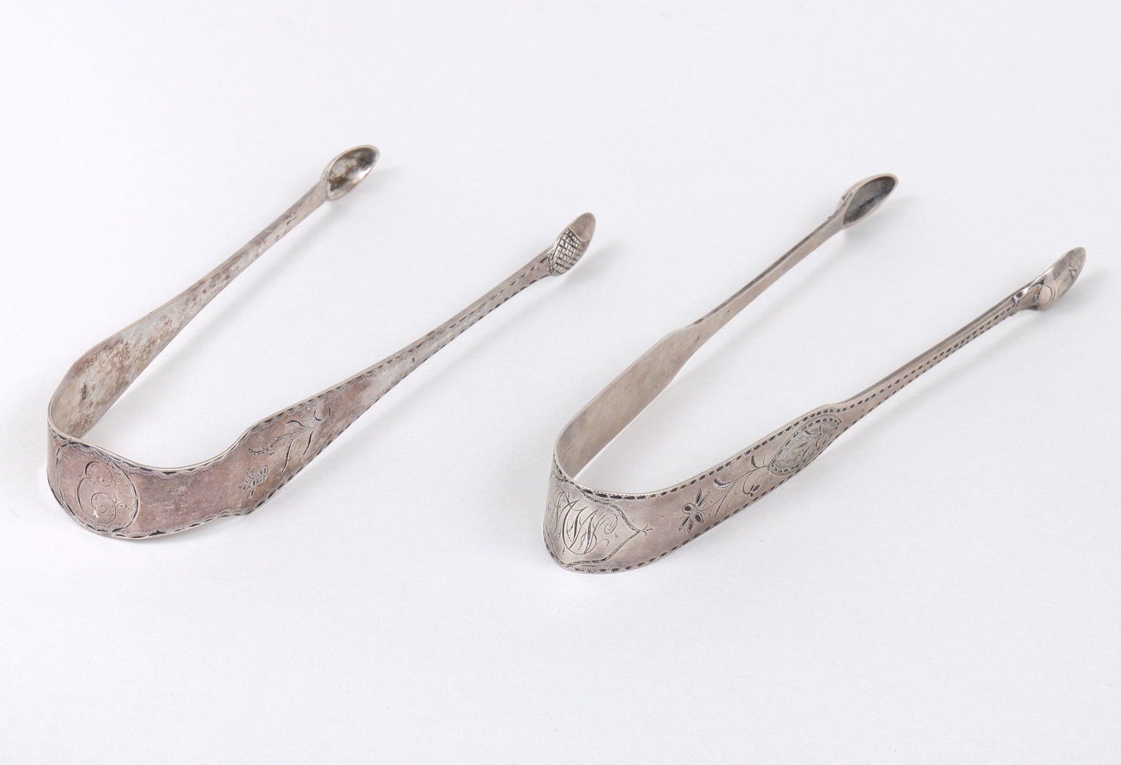 Two pair of Lancaster, PA sugar tongs, William Haverstick, Sr. or William Haverstick, Jr., circa: Two pair of Lancaster, PA sugar tongs, William Haverstick, Sr. or William Haverstick, Jr., circa 1795-1800; together with the Lancaster Journal newspaper, April, 1805 with advertisement by Wm. Haverst