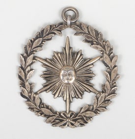 Silver gilt Masonic emblem with garland and sun, Jacob Bennett, Philadelphia, circa 1850.