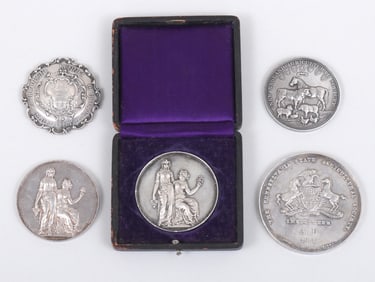 Group of (5) American agricultural and sporting silver medals.