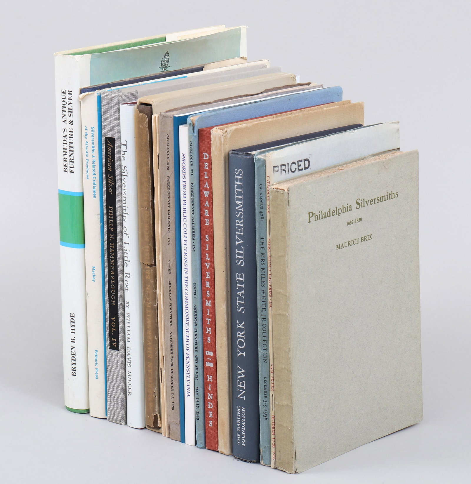 Group of (17) books on early American silver.: Group of (17) books on early American silver. To include: "American Silversmiths in British North America, 1776-1800" by John E. Langdon, Toronto: Privately Published, 1970, with glassine wr