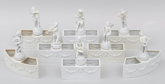 German Bisque Porcelain Eight-Piece Table Garniture