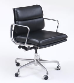 Charles and Ray Eames (American 20th century), Soft Pad Management Chair, in black leather with