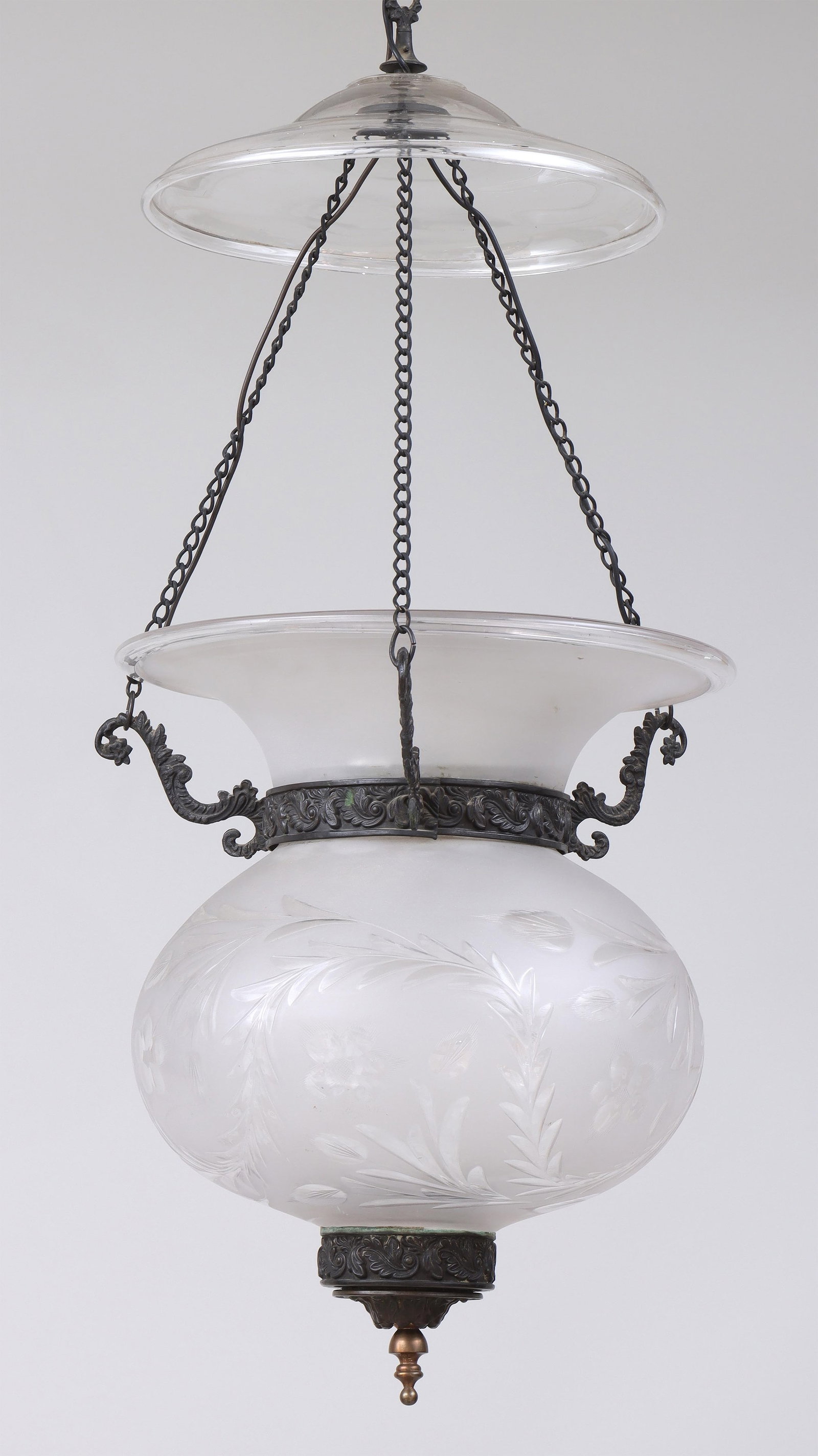 Brass-Mounted Hanging Lantern: Brass-Mounted Hanging Lantern frosted and cut-glass, the brass mounts with a scrolled foliate design, and the lower shade cut in a floral and foliate pattern, ending in a brass drop finial. 24''h. Pro