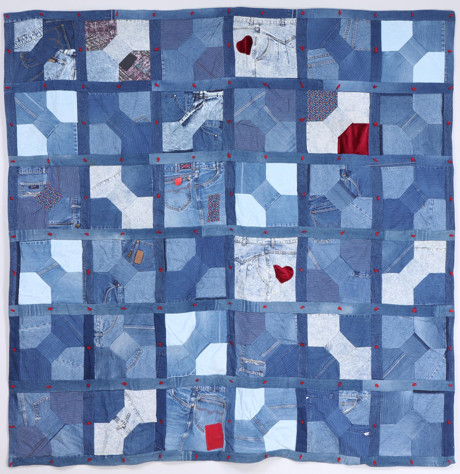 Bowtie Quilt: Bowtie Quilt framed squares, pieced, circa 1940s, cotton denim. Provenance: Estate of Fran?ois Meyer; Purchased from Laura Fisher, Fisher Heritage, New York, NY. 84 x 81 in. (213.4 x 205.7 cm.)