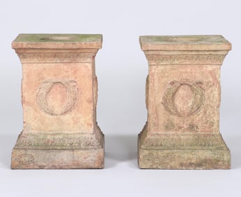 Pair of Terracotta Square Pedestals with Wreath Decoration.