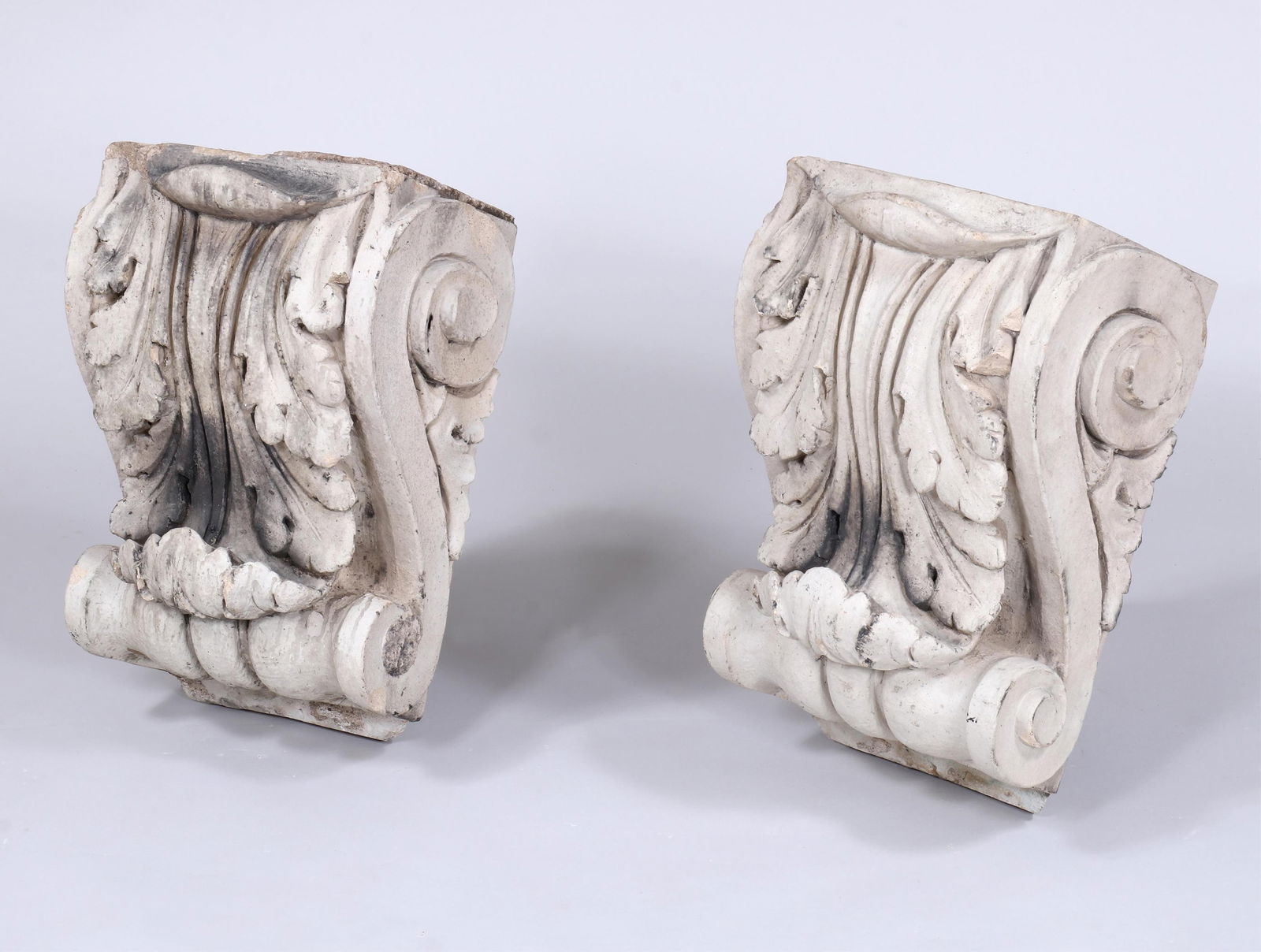 Pair of 19th Century New York City Cast Stone Corbels: Pair of 19th Century New York City Cast Stone Corbelsof S-scrolled form with acanthus leaf detail, from 110th street building.20 3/4 x 13 x 15 in. (52.7 x 33 x 38.1 cm.)