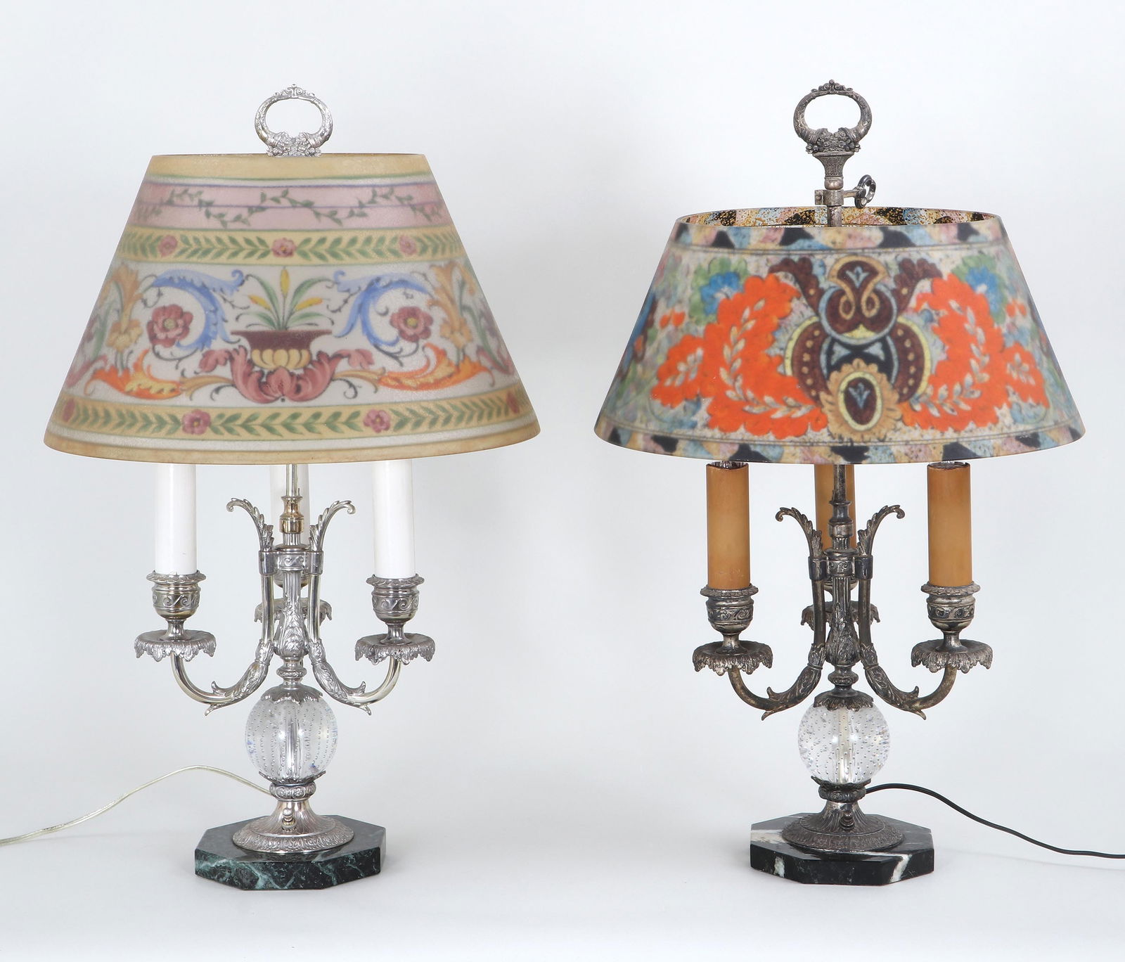 Pair of Pairpoint Three-Light Candelabra Lamps: Pair of Pairpoint Three-Light Candelabra Lamps with Reverse-Painted Glass Shadeseach having finial in the form of a pair of cornucopias over a basket and three faux candles in silverplate candle cups