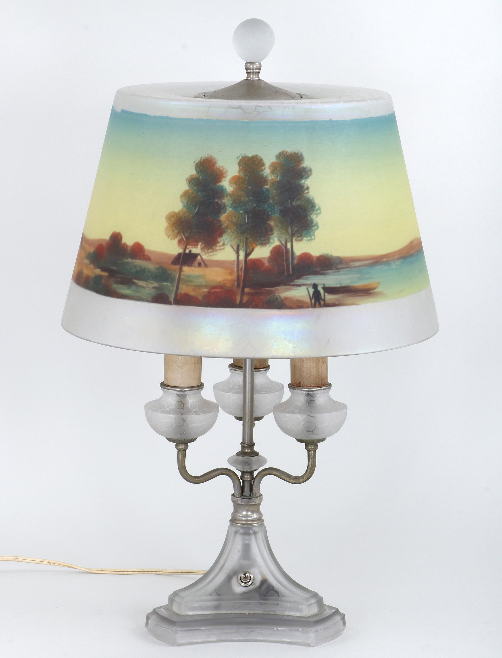 Jefferson Reverse-Painted Glass Table Lamp: Jefferson Reverse-Painted Glass Table Lamp the glass shade having a reverse-painted autumn landscape with figure and boat on a lake, marked "Jefferson" on metal fitter ring, on a tripartite base with 