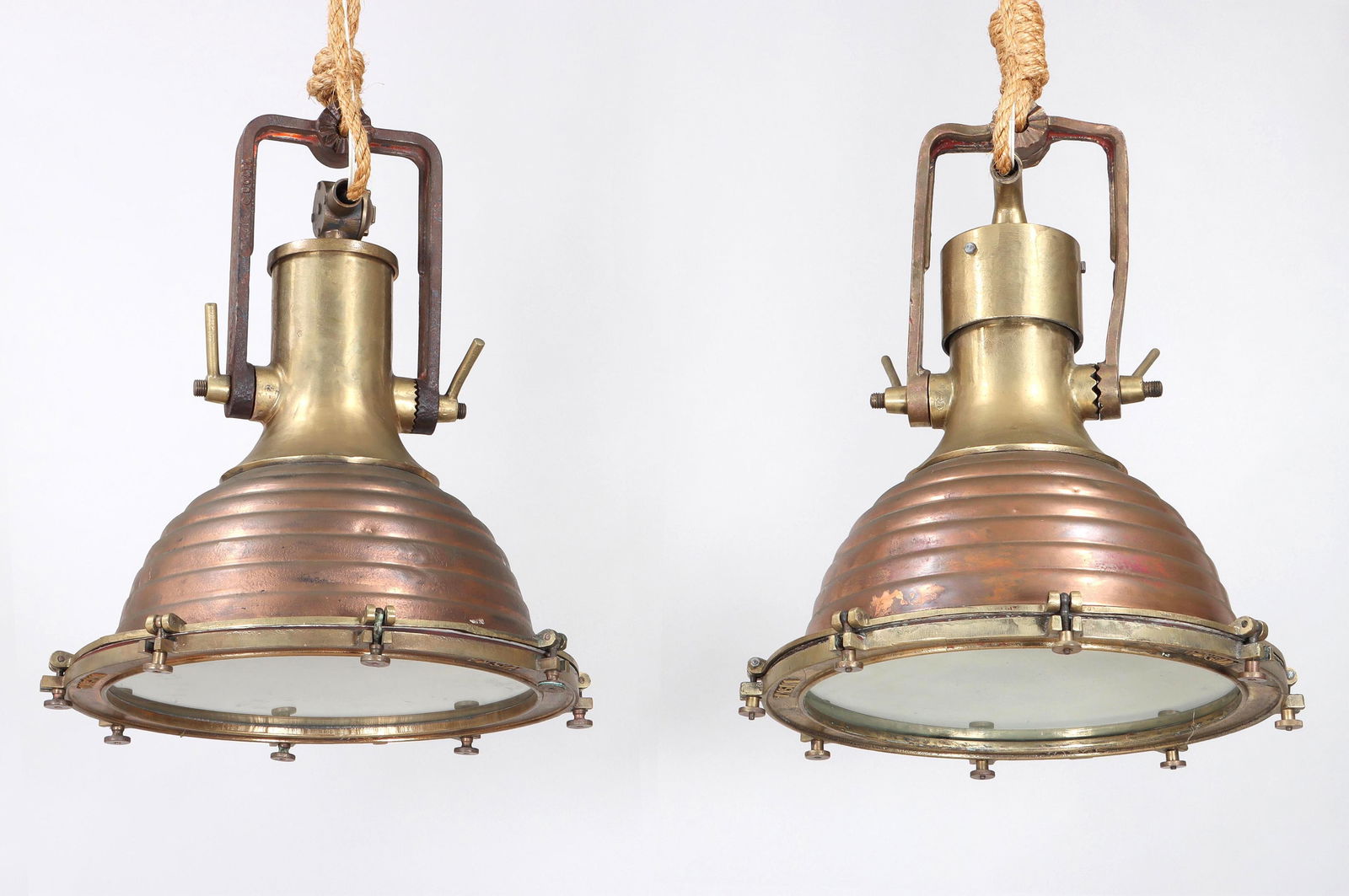 Large Brass and Copper Ship Searchlights: Pair of Large Brass and Copper Ship Searchlightswired for use as chandeliers.22 1/2 x 19 in. diameter (57.2 x 48.3 cm. diameter)