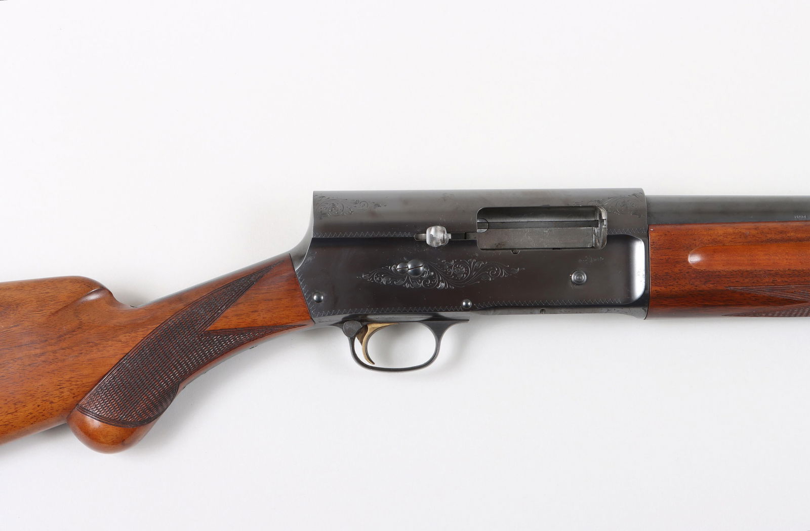 Browning “Light Twelve" A5, Made in Belgium: Browning “Light Twelve” A5, Made in BelgiumThe barrel measures 29-1/2" with a full choke, and matte line on the barrel top. The receiver is marked "Light Twelve" with hand-cut engraving. The s