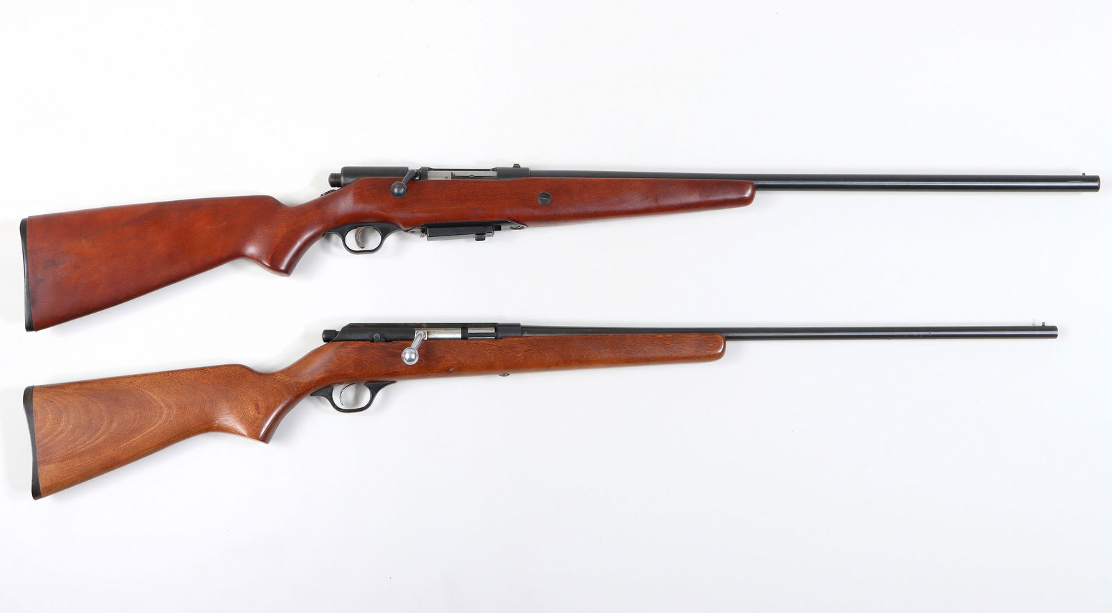 Group of (2) Bolt Action Shotguns: Group of (2) Bolt Action Shotgunsto include: 1) Western Field M149 20 gauge 2-3/4". The barrel measures 26" with a bright bore and is choked tight modified with a removable clip. The gun shows little