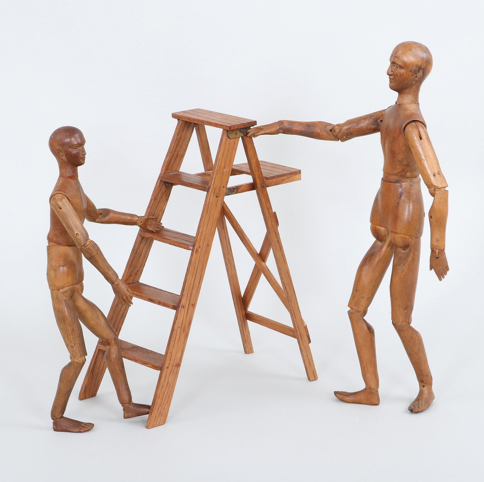 Group of (2) 19thC. French Articulated Artist's Mannequins: Group of (2) 19th Century French Articulated Artist's Mannequins with Folding Ladder to include: (2) 19th century French articulated wood artist's mannequins or lay figures, the larger with indecipher