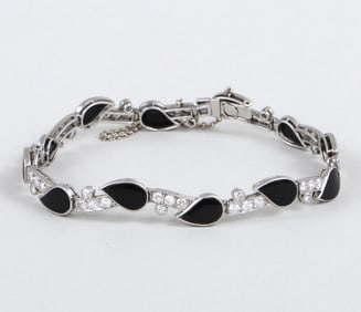 Cartier Art Deco Diamond, Onyx, and Platinum Bracelet
